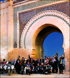 Motorcycle Tour Morocco Hispania Tours riders in front of moroccan gate
